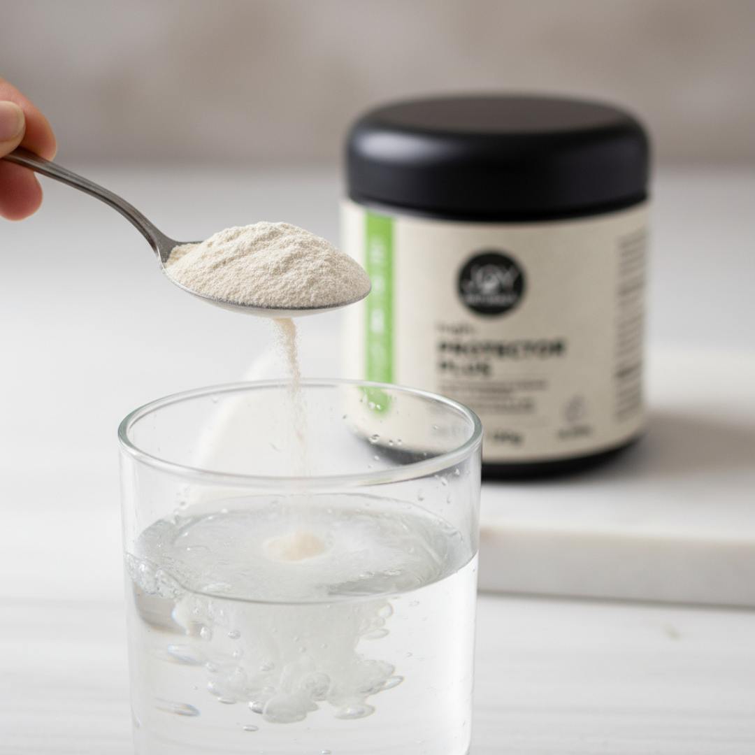 Probiotikum in ein Glas Wasser rühren